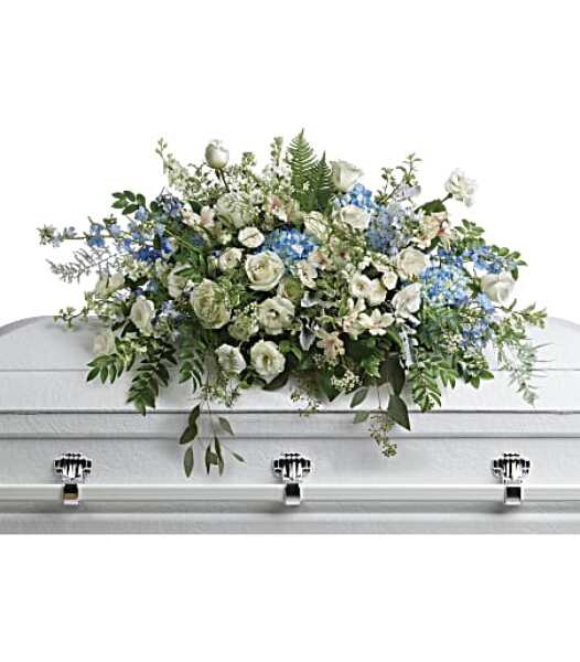 Tender Remembrance Casket Spray from Clifford's where roses are our specialty