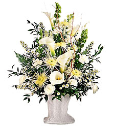 Solemn Offering Arrangement from Clifford's where roses are our specialty