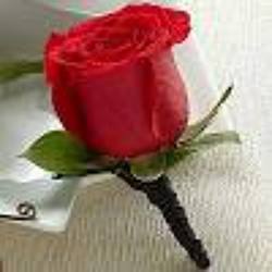 Red Boutonniere from Clifford's where roses are our specialty