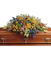 Colorful Reflections Casket Spray from Clifford's where roses are our specialty