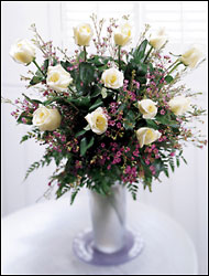 Graceful Grandeur Arrangement from Clifford's where roses are our specialty