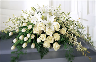 The  Resurrection Casket Spray from Clifford's where roses are our specialty