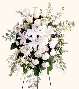 Quiet Tribute Standing Spray from Clifford's where roses are our specialty
