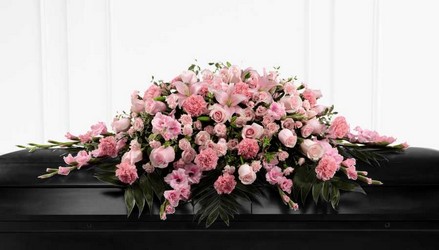 The  Sweetly Rest(tm) Casket Spray from Clifford's where roses are our specialty