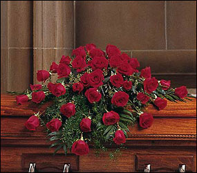 Blooming Red Roses Casket Spray from Clifford's where roses are our specialty